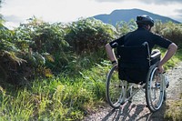 Wheelchair bound man in the wilderness