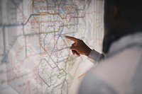 Couple checking a public transportation map