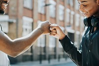 Fitness partners doing a fist bump