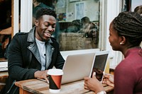 Entrepreneurs working remotely at a cafe