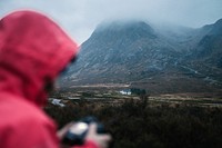 Female photographer at Glen Etive, Scotland