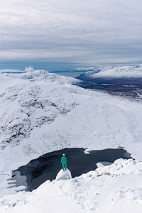 Woman on a snowy mountain
