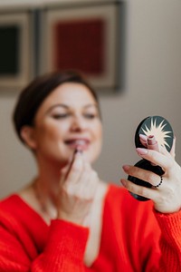 Woman glamming up for a night out