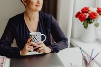 Business woman enjoying a mug of tea