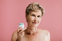 Elderly woman with a cream container mockup
