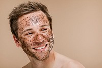 Happy man scrubbing his face