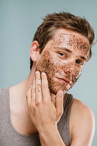 Man doing a face scrub