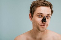 Man wearing a black pore mask