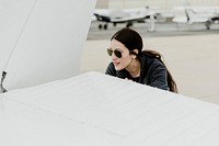Airwoman doing a preflight check