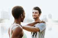 Couple doing a yoga in a park