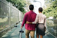 Couple walking together on pathway