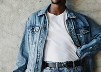 Black man wearing a silk screen white t-shirt