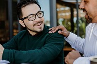 Business partners talking in a cafe