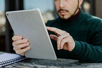 Man using a digital tablet