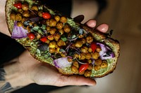 Woman having chickpea toast for breakfast