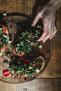 Woman eating kale toast for lunch