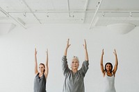 Diverse people practicing Urdhva Hastasana pose