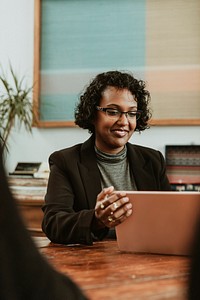 Black businesswoman with a digital tablet