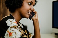 Black woman talking on the phone