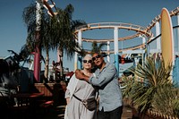 Cute senior couple at an amusement park