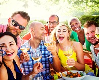 Diverse group of friends having a garden party