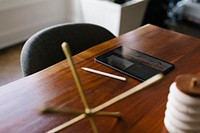 Digital tablet on a wooden table