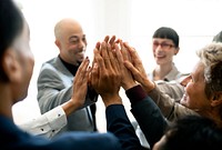 Cheerful business people doing a high five