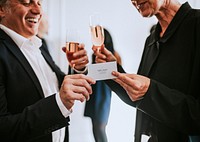 Businessman handing over a business card mockup