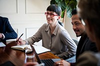 Happy business woman in a meeting