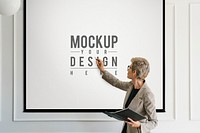 Blonde aged woman having a presentation mockup