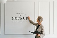 Blonde aged woman having a presentation mockup