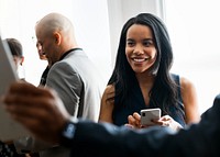 Black businesswoman using a mobile phone