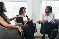 Happy businesswomen having a meeting in the office