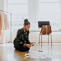Young female designer in a boutique