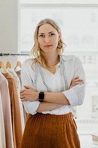 Designer wearing a measuring tape around her neck