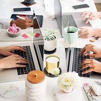 Businesswomen using a laptop at work