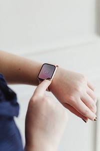Woman wearing a digital smartwatch mockup with music icon