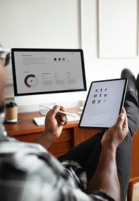 Black man using a digital tablet mockup