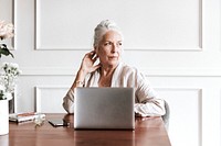 Senior businesswoman using a laptop
