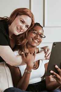 Happy diverse women taking a selfie