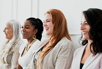 Happy gorgeous women standing together