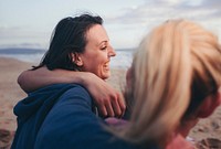 Cheerful friends on the beach