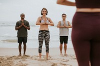 Yogis enjoying a session at the beach