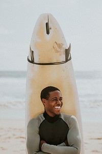 Cheerful man with a surfboard
