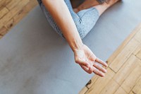 Fitness woman in a Padmasana pose