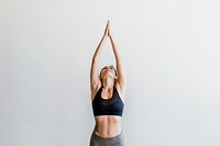 Sportive woman doing a Vriksasana pose