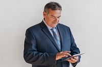 Businessman using a digital tablet mockup