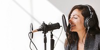 Female singer singing live in a studio