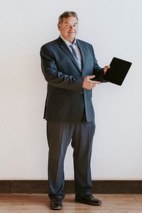 Businessman showing a digital tablet mockup mobile phone wallpaper
