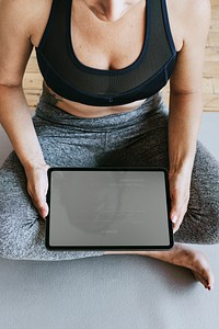 Yoga instructor using a digital tablet mockup mobile phone wallpaper
